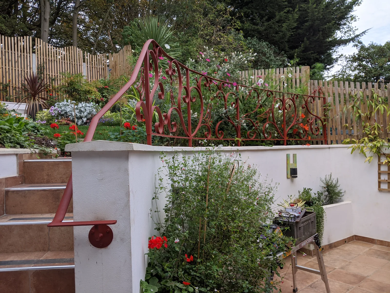 Curved safety railings to a terraced garden, photo 1 of 3
