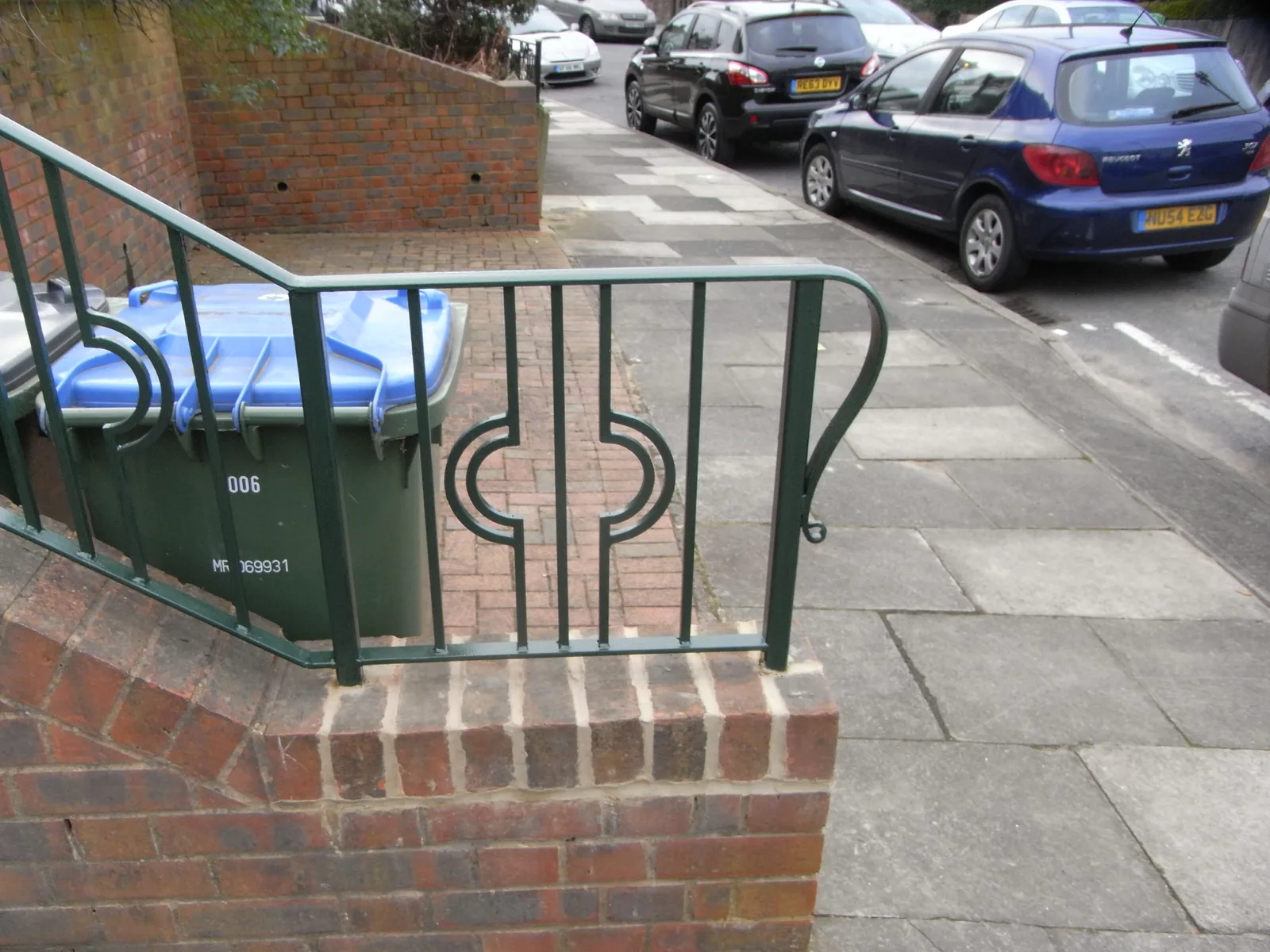 Hand rail to steps to front entrance, photo 2 of 4