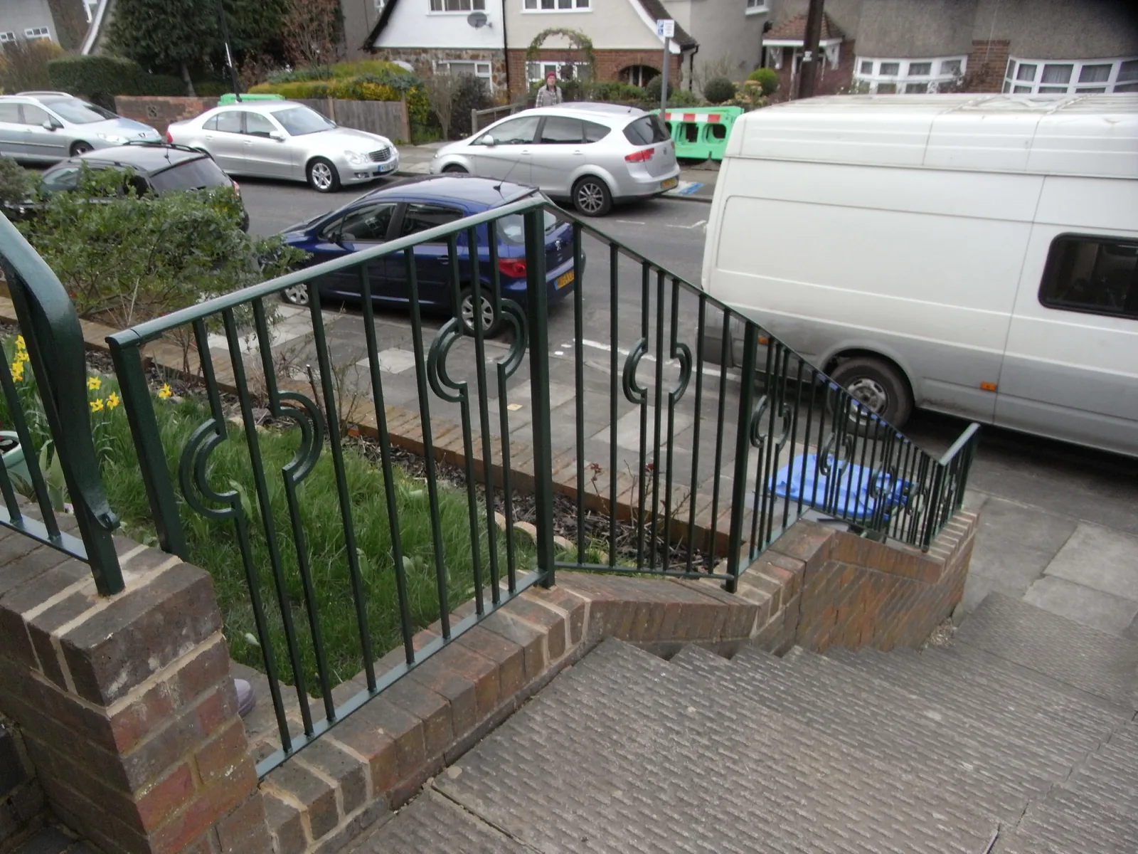 Hand rail to steps to front entrance, photo 1 of 4